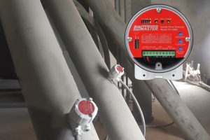 Flow detector prevents plugged chutes and cross contamination
